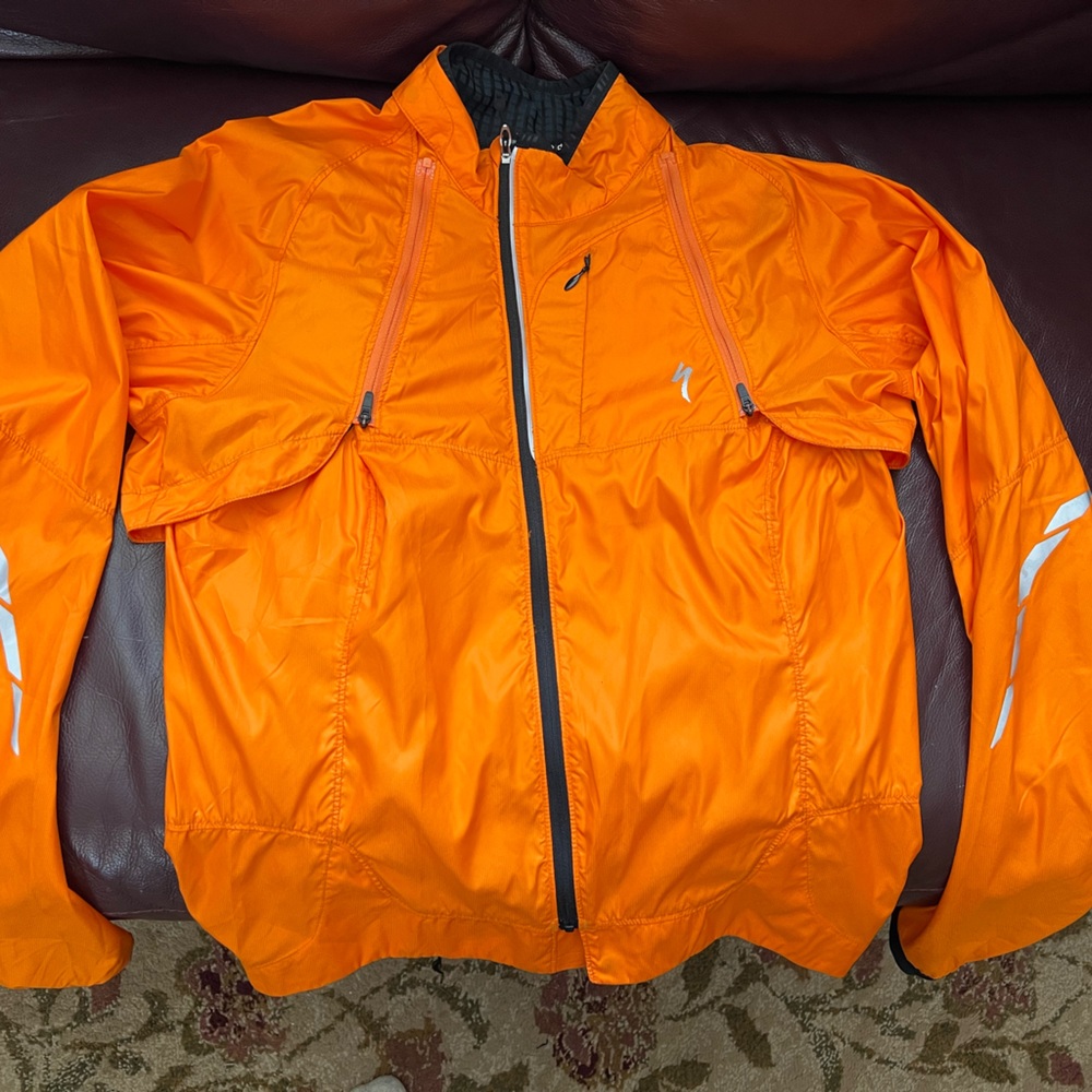 Specialized Deflect Reflect Convertible rain jacket. Semi form fit, S, orange